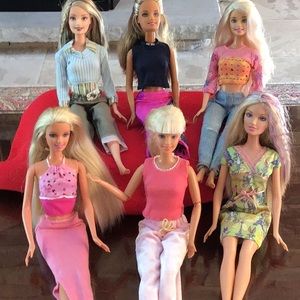 Six pretty Barbie dolls All marked 1999
